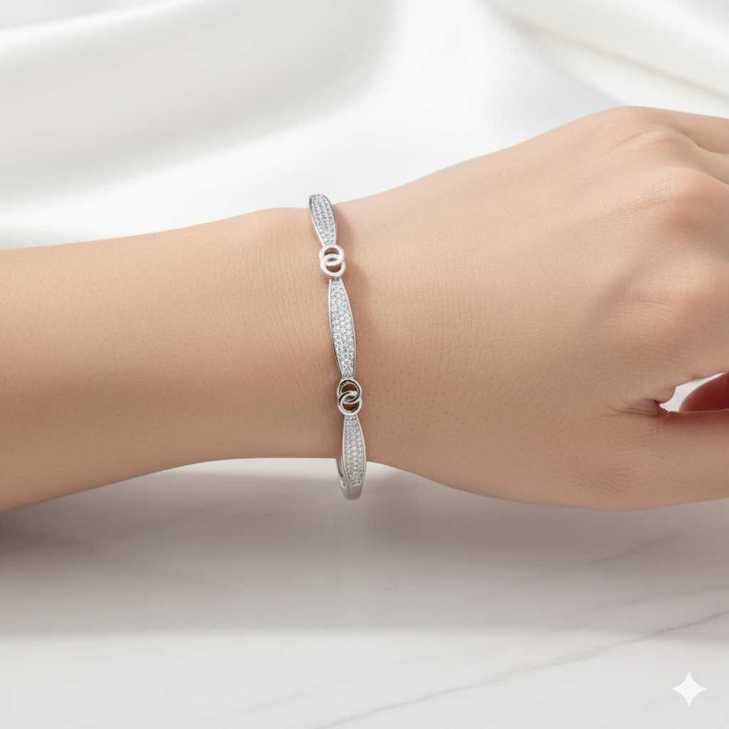 Dainty Silver-Plated Knot Bangle Bracelet with Cubic Zirconia Accents