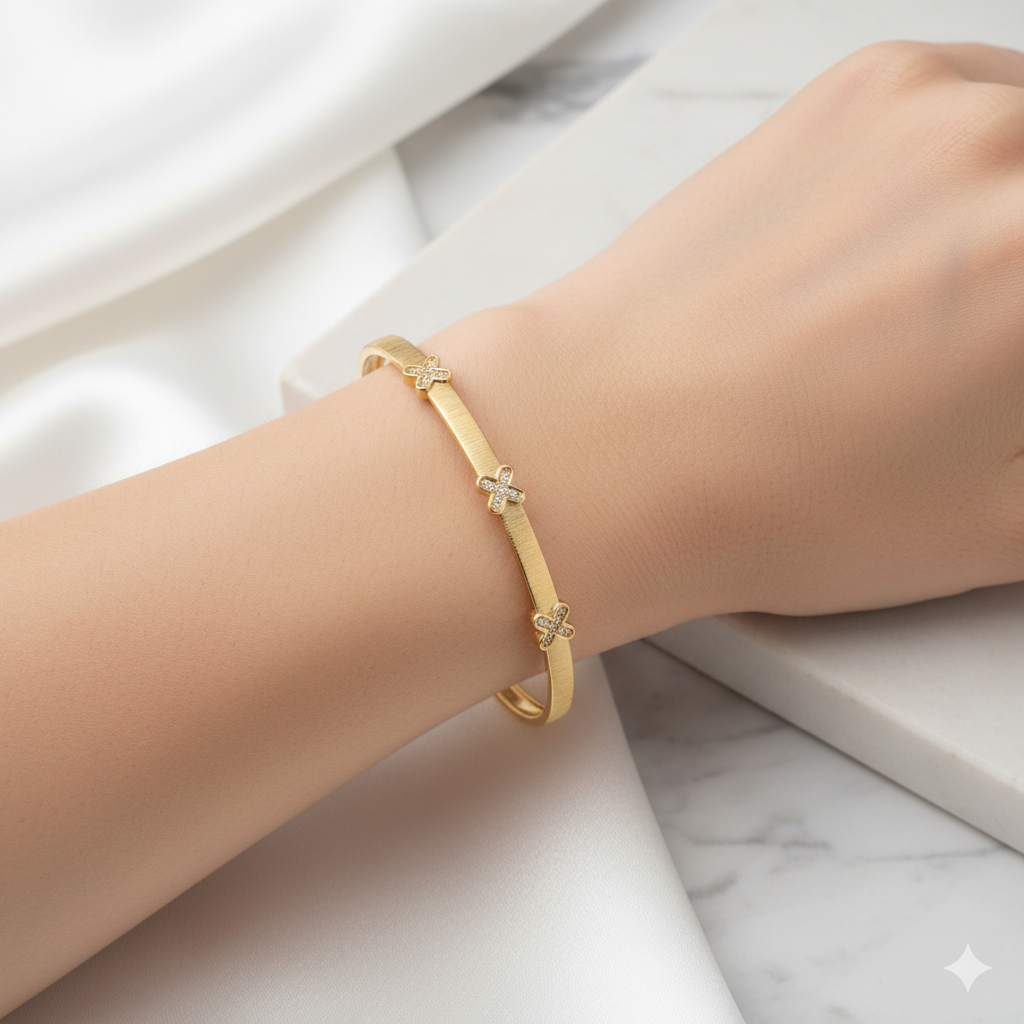 Minimalist Gold-Plated Cuff Bracelet with Embellished X Accents