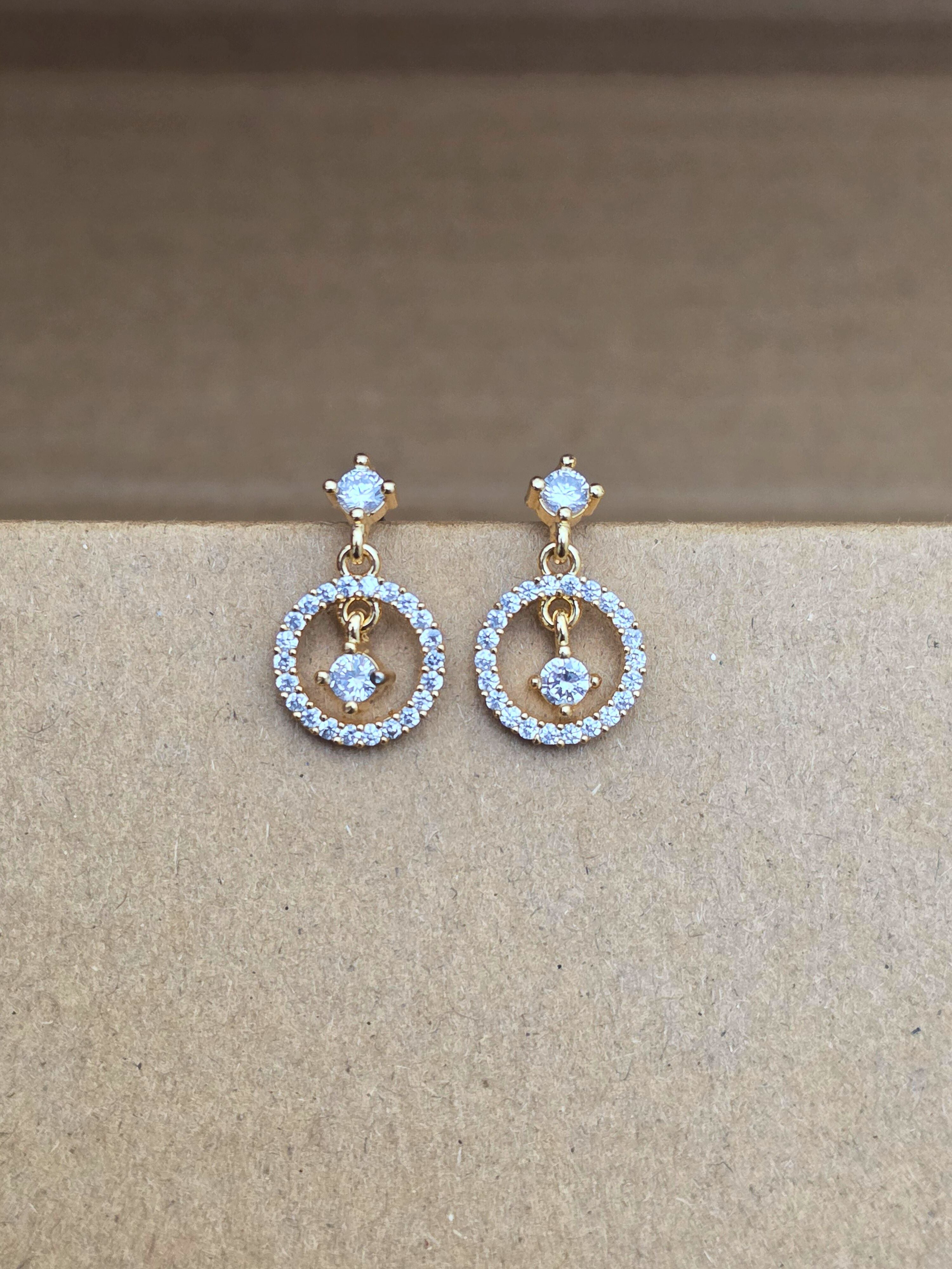 Golden Hoop Earrings with Crystal Embellishments