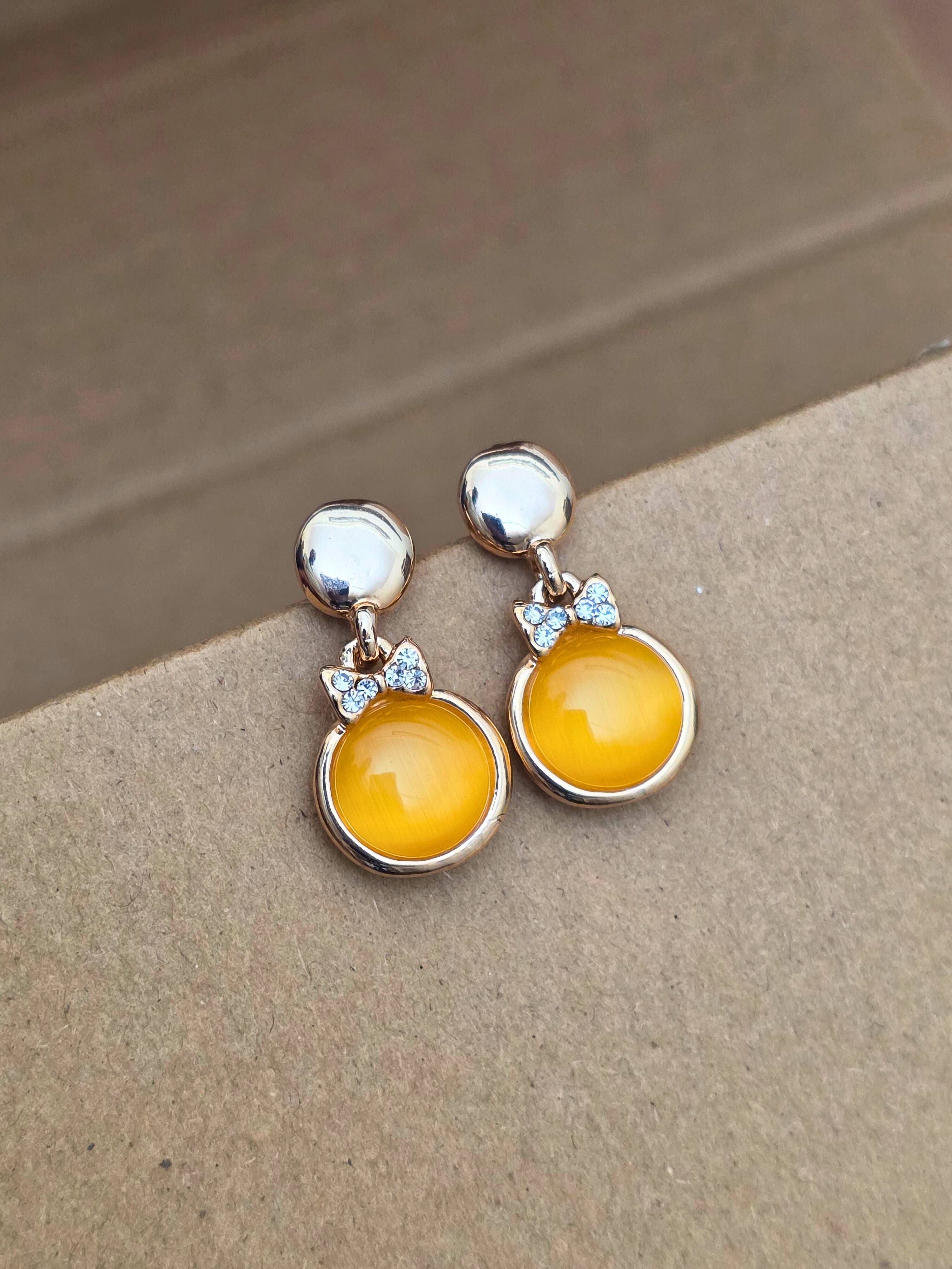 Rose Gold-Plated Dangle Earrings with Orange Cats Eye Stone