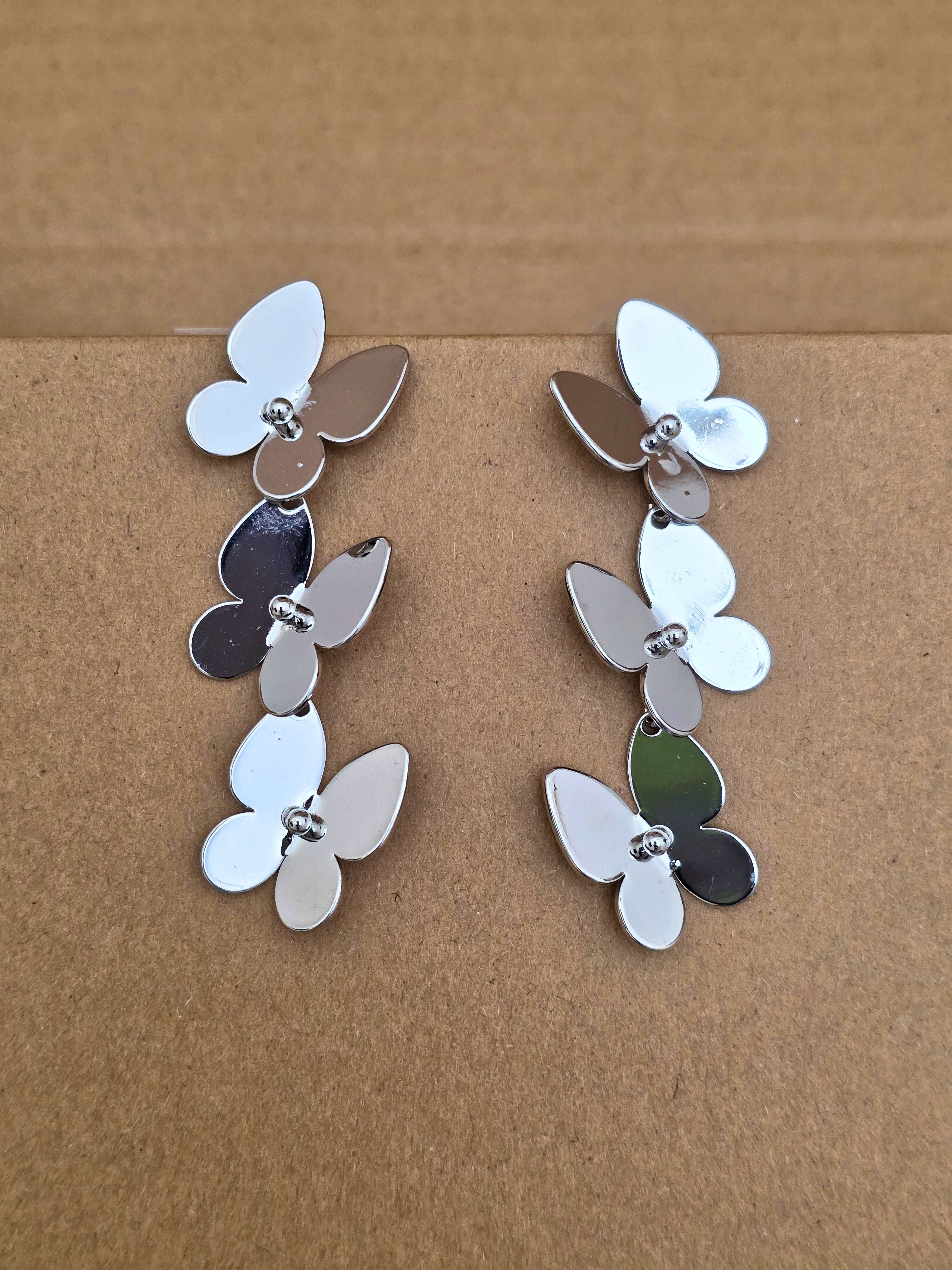 Sleek Silver-Toned Butterfly Hoop Earrings