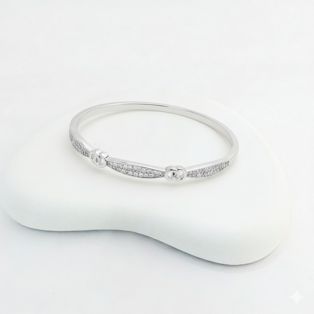 Dainty Silver-Plated Knot Bangle Bracelet with Cubic Zirconia Accents