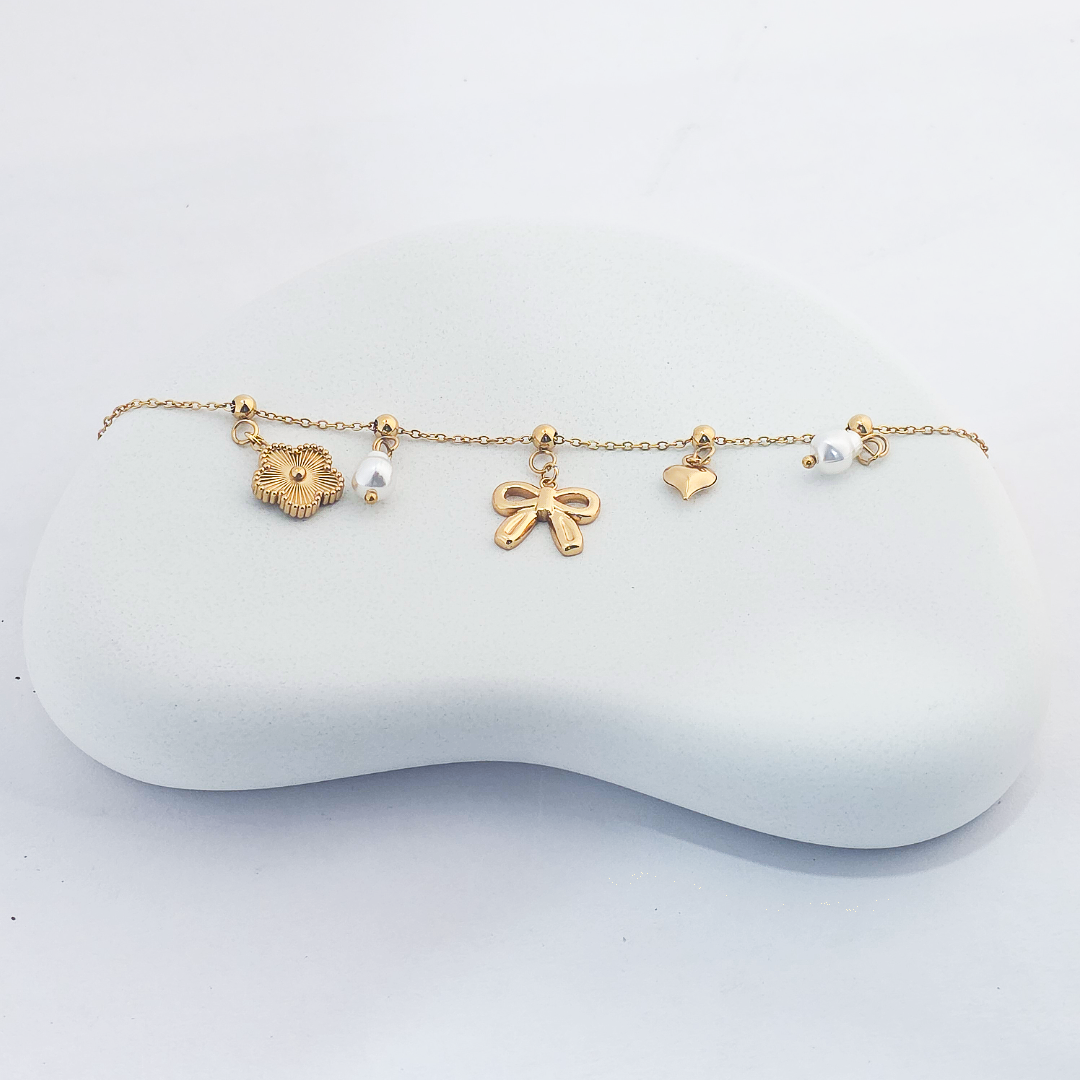 Clover Bow and Pearl Charm Bracelets